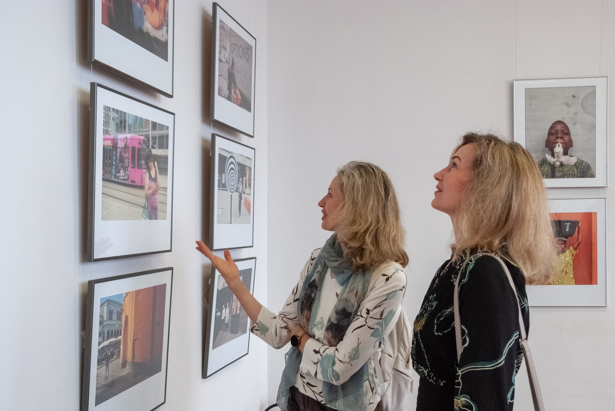 Visitors in front of the photographic displays in Zarasai